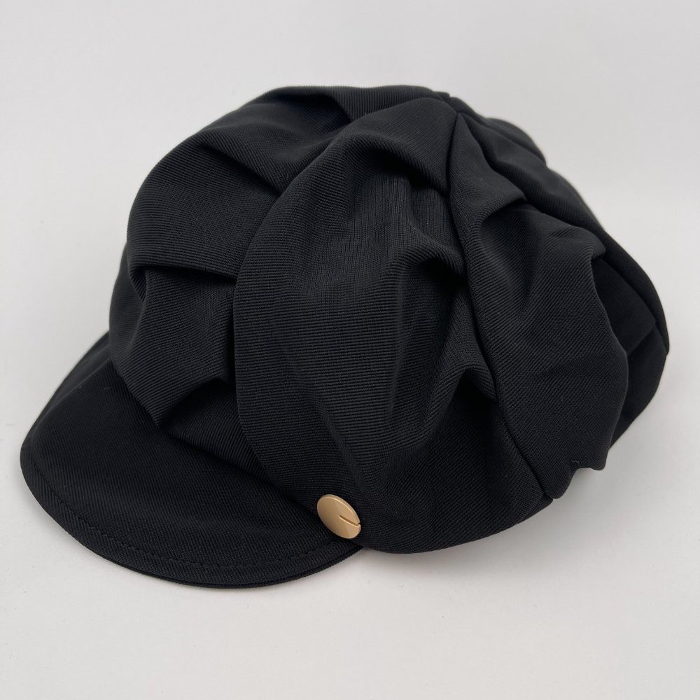 Elegant Black Textured Fabric Cap with Sculptural Bow